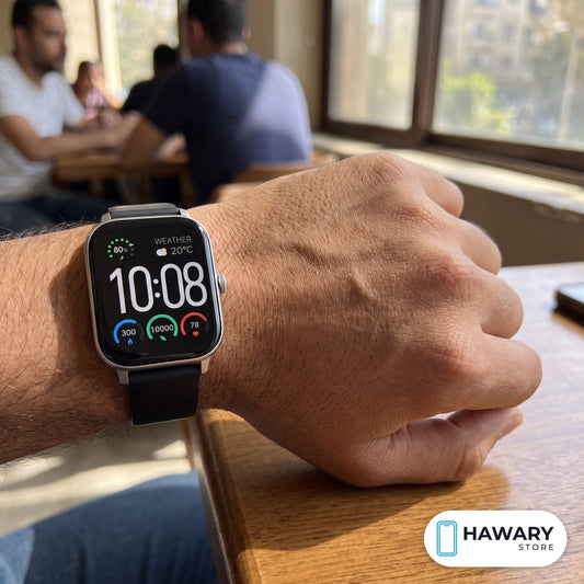 Haylou Watch S6 smart watch worn on the wrist in a cafe