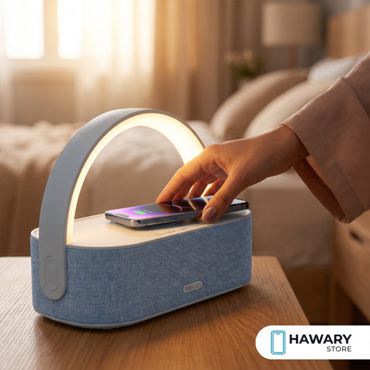 Recci RLS-L16 4-in-1 speaker charging a phone on a bedside table